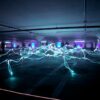 linked neon lights under white painted basement