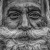 grayscale photo of mans face