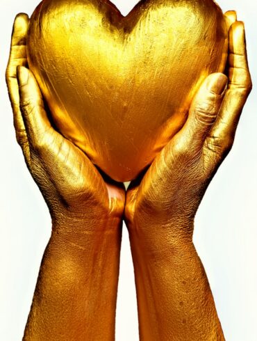 persons hand on white surface