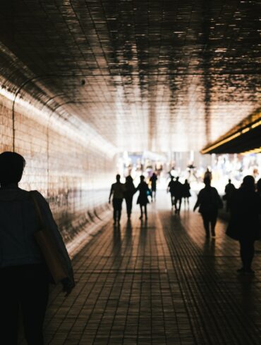 people walking on a hallway