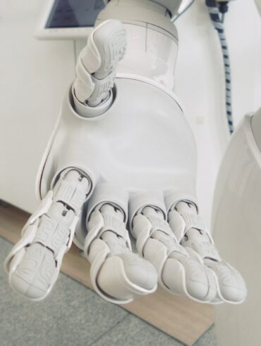 closeup photo of white robot arm