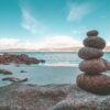 gray rocks on seashore during daytime