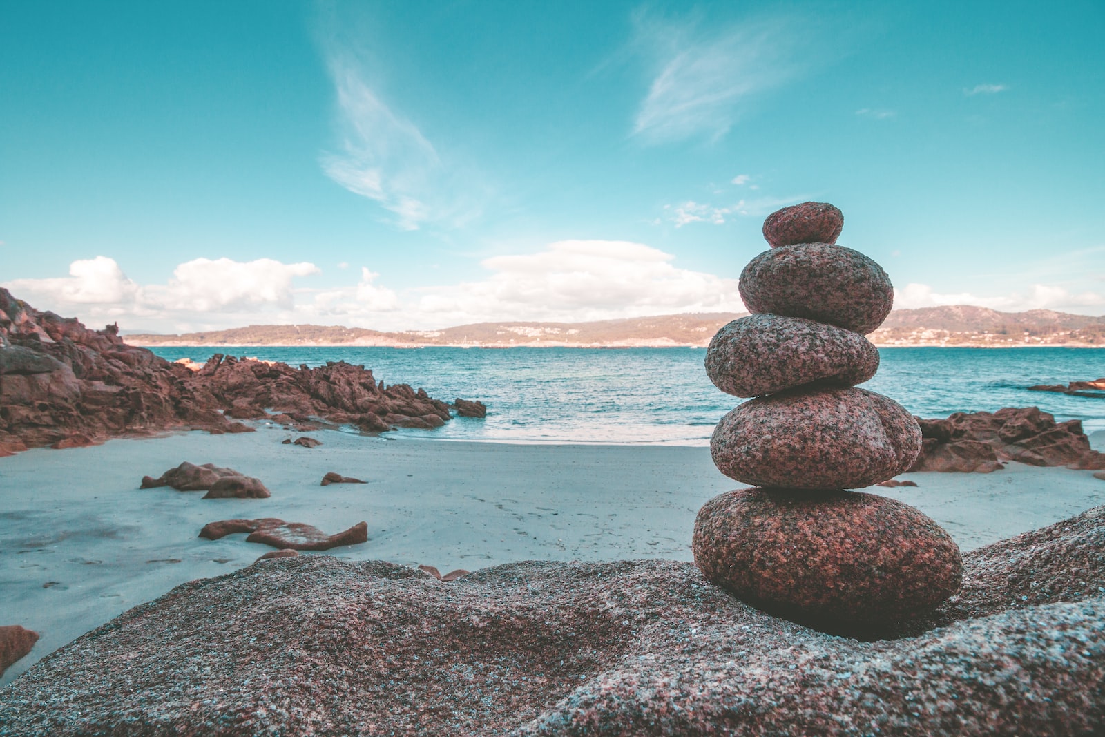 gray rocks on seashore during daytime