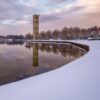 tower near lake during daytime