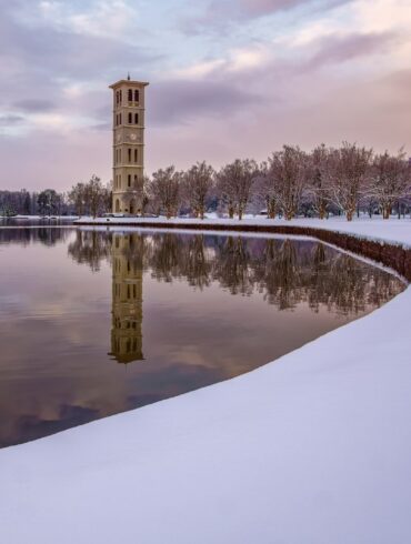 tower near lake during daytime