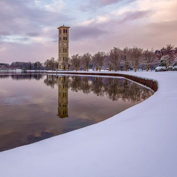 tower near lake during daytime