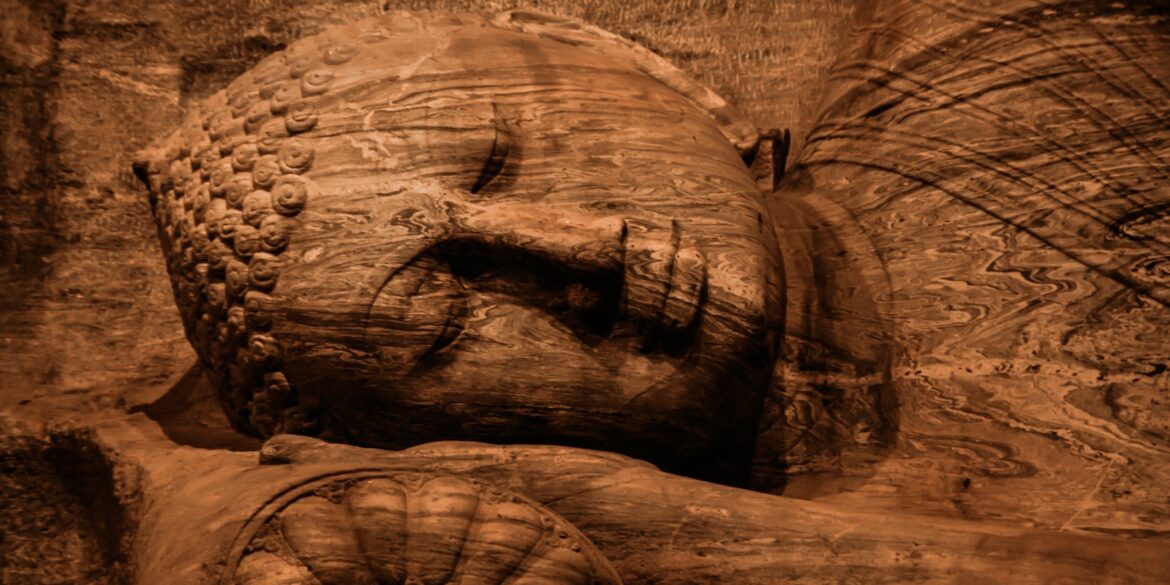 brown buddha sculpture