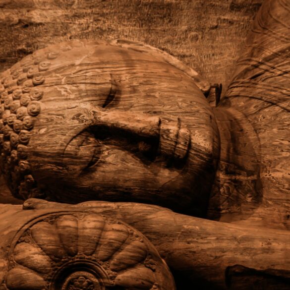 brown buddha sculpture