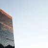 low angle photo of curtain wall building at daytime