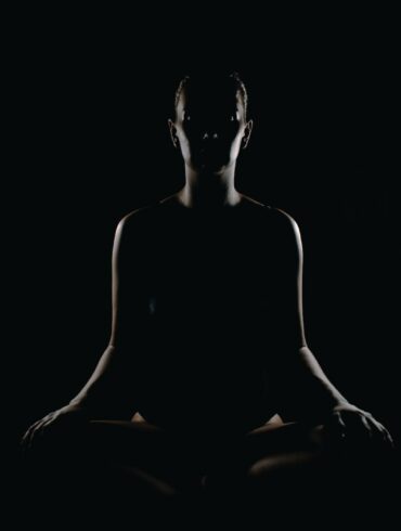 person doing meditation pose