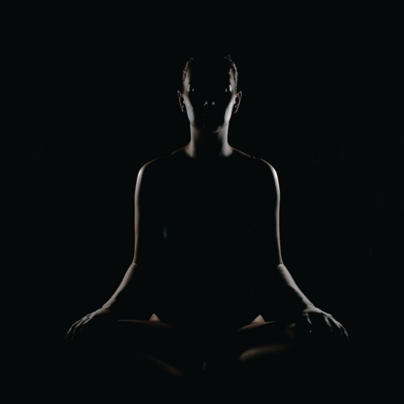 person doing meditation pose