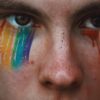 closeup photography of person with rainbow eyeshadow