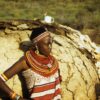 woman standing in front of rock formation