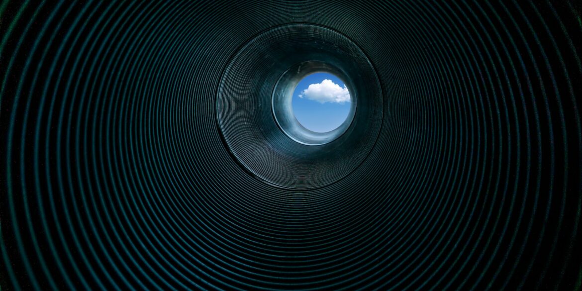 low angle photography of tube interior