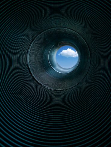 low angle photography of tube interior