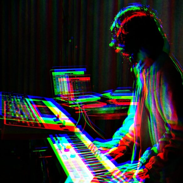 man playing electronic keyboard