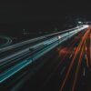 time lapse photography of lighted road at night