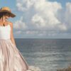 woman walking near body of water