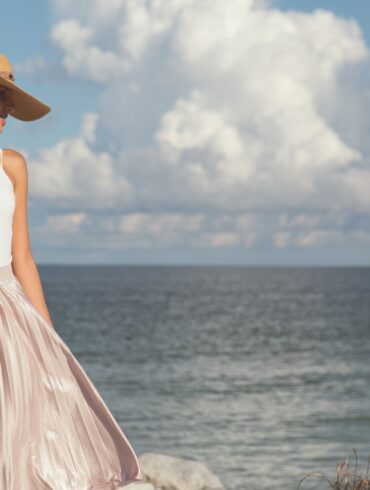woman walking near body of water