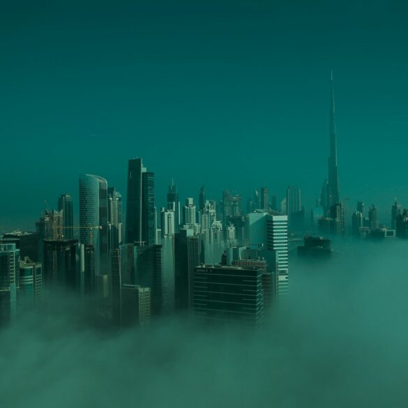 city skyline under blue sky during daytime