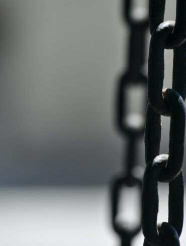brown metal chain in close up photography