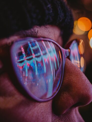 a close up of a person wearing sunglasses