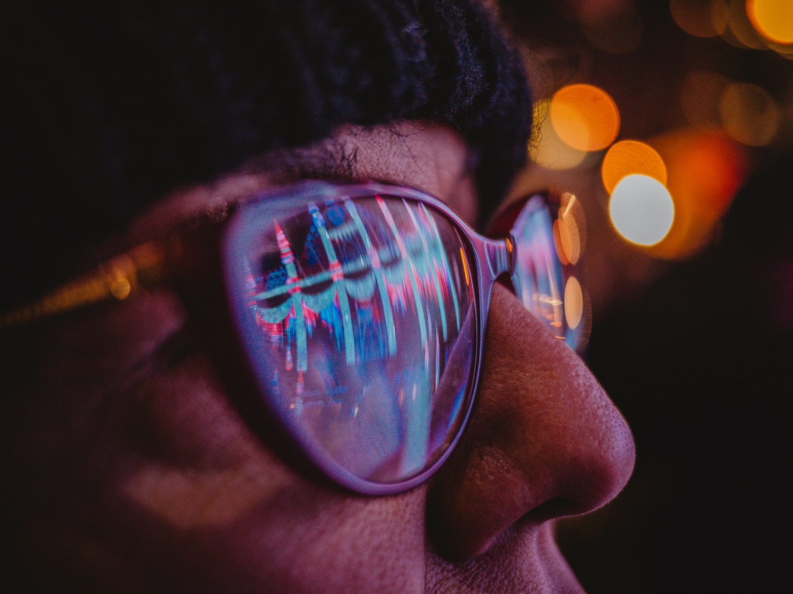 a close up of a person wearing sunglasses