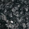 Backdrop of burnt coal with rugged surface