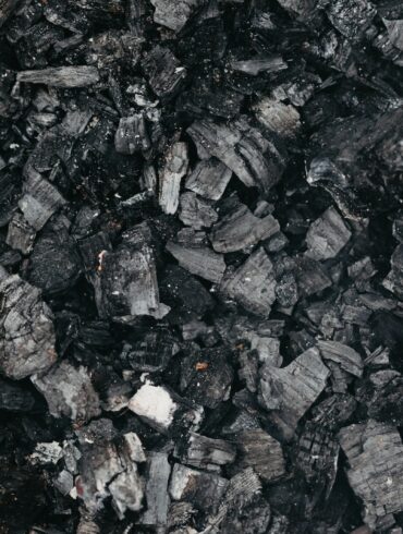 Backdrop of burnt coal with rugged surface