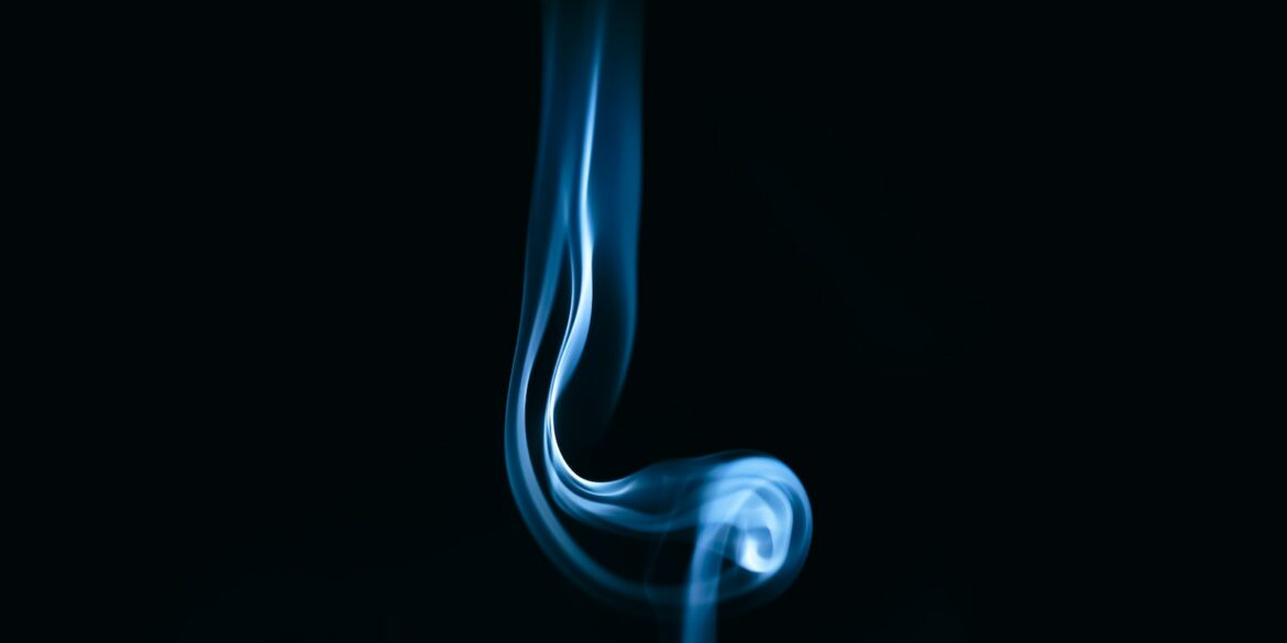 white smoke in black background