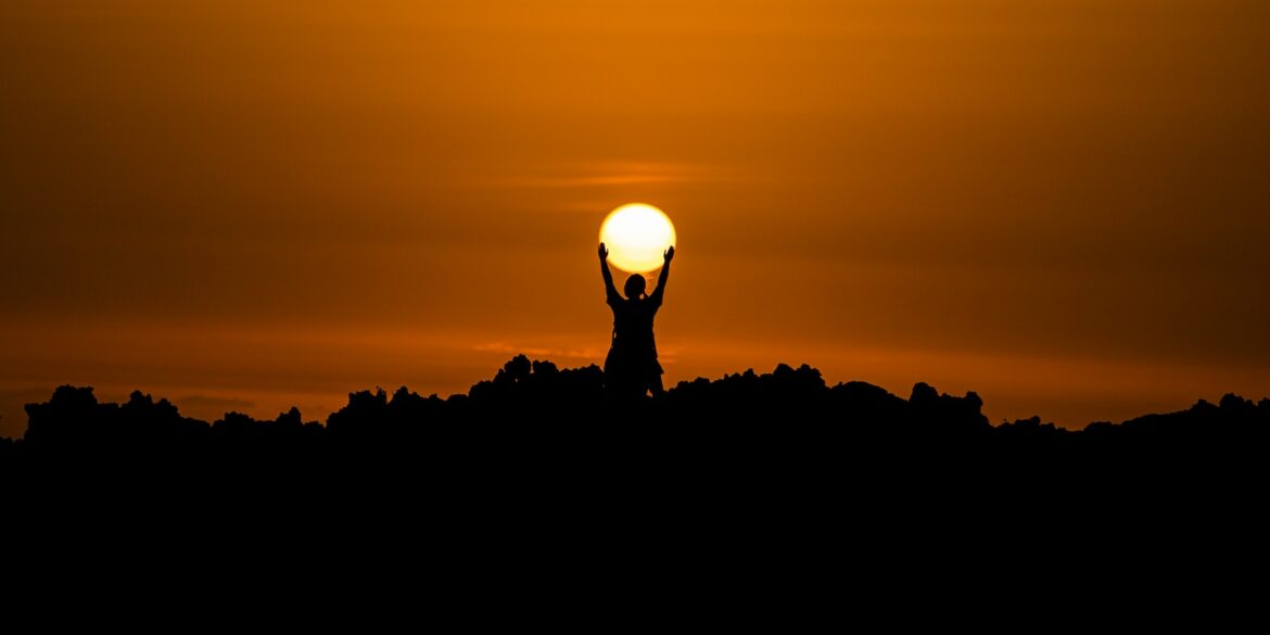 silhouette of person holding dun