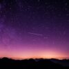 silhouette photo of mountain during night time