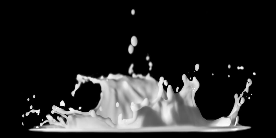a black and white photo of a liquid splash