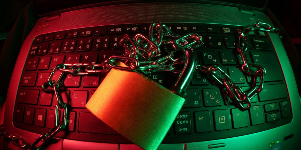 brown padlock on black computer keyboard