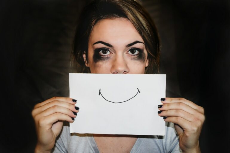 person holding white printer paper