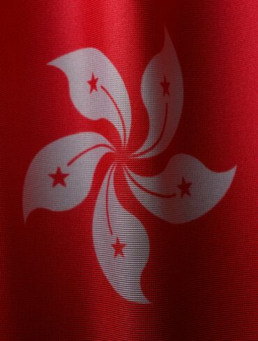 a close up of a red and white flag