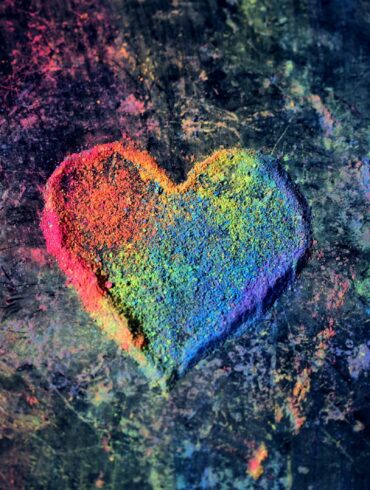 green and red heart shaped textile