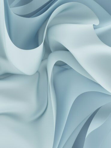 a close up of a blue and white fabric