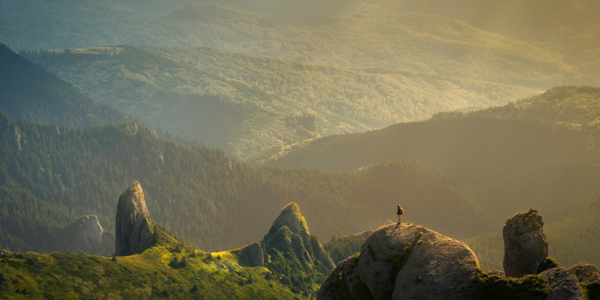 landscape photography of mountain hit by sun rays