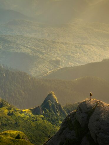 landscape photography of mountain hit by sun rays