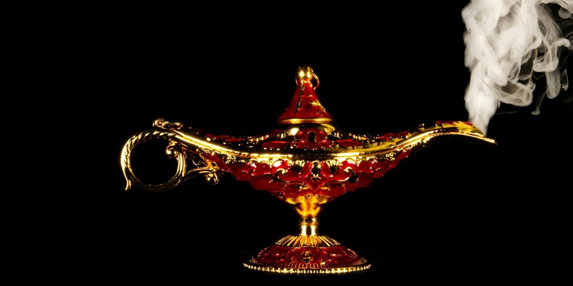 A red and gold teapot with smoke coming out of it