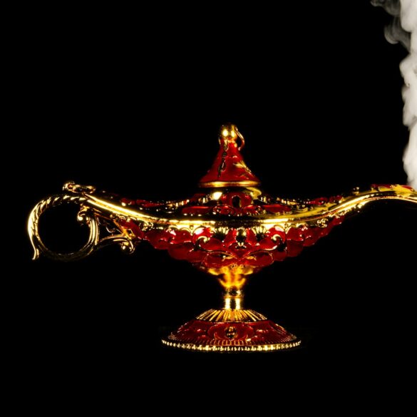 A red and gold teapot with smoke coming out of it