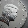 a close up of a silver coin with a picture of president donald