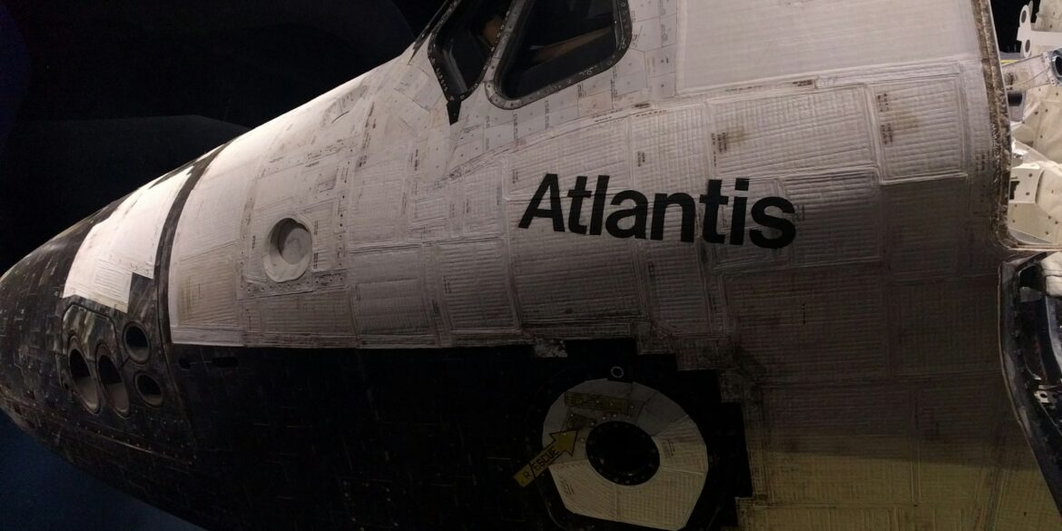 white and black airplane during night time