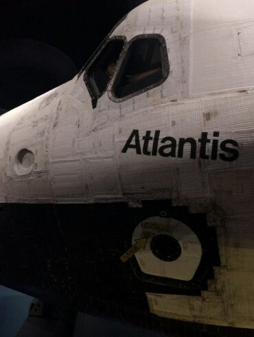 white and black airplane during night time