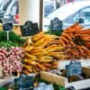 a market with vegetables and fruits