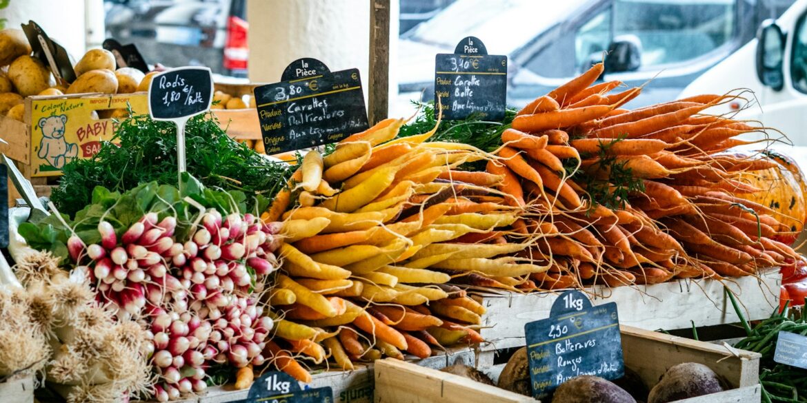 a market with vegetables and fruits