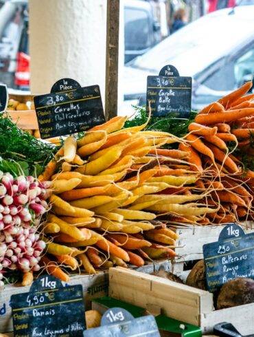 a market with vegetables and fruits