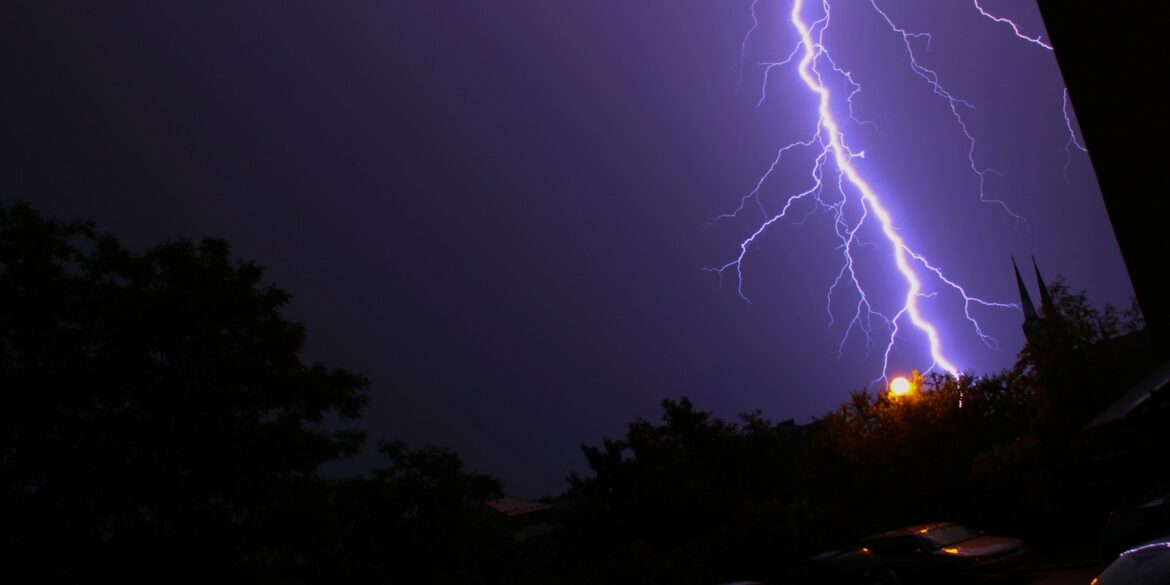 lightning bolt in dark rainy night