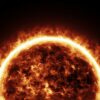 a bright sun is shown in the dark sky
